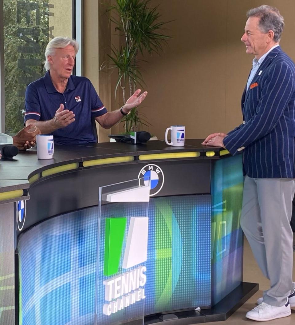 Ken Solomon (right), CEO of Tennis Channel, talks with tennis Hall of Famer Bjorn Borg in the Tennis Channel studio at the Indian Wells Tennis Garden  during coverage of this year's BNP Paribas Open.