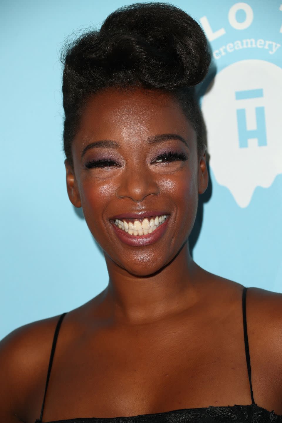 <p>Actress <strong>Samira Wiley</strong> is showstopping in a tapered updo. Blow out your <a href="https://www.goodhousekeeping.com/beauty-products/g34894772/best-flat-irons-for-natural-hair/" rel="nofollow noopener" target="_blank" data-ylk="slk:natural hair;elm:context_link;itc:0;sec:content-canvas" class="link ">natural hair</a> and twist it up to create <a href="https://www.goodhousekeeping.com/beauty/hair/tips/g1800/celebrity-hairstyles-updo/" rel="nofollow noopener" target="_blank" data-ylk="slk:a beautiful updo;elm:context_link;itc:0;sec:content-canvas" class="link ">a beautiful updo</a> that allows the focus to be on your face. </p>