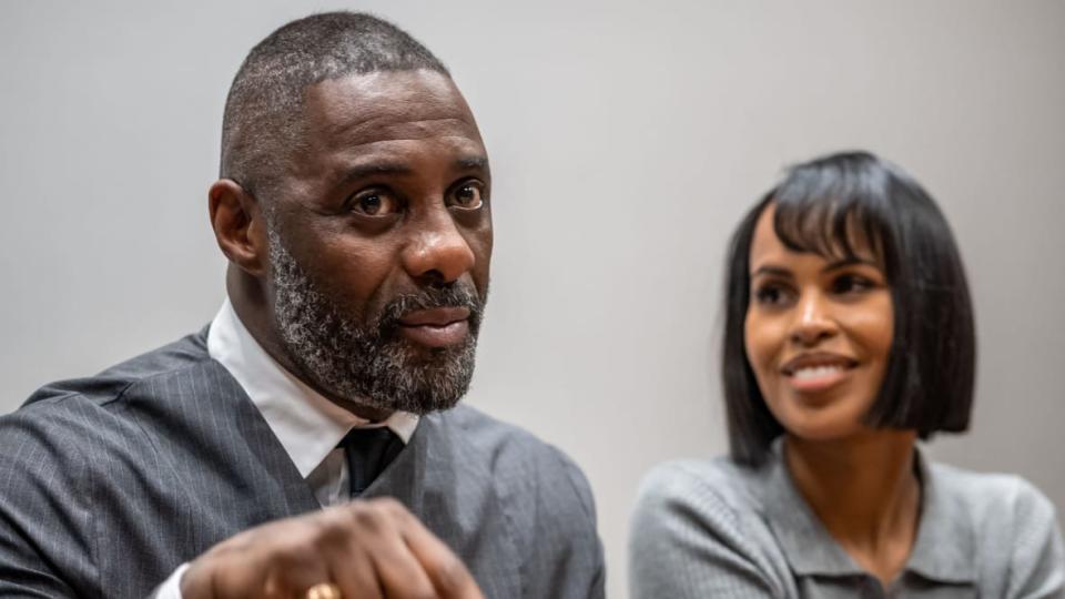 British actor Idris Elba (L) with his wife US model and activist Sabrina Dhowre Elba answer during an interview with AFP at the World Economic Forum (WEF) annual meeting in Davos, on January 16, 2023. (Photo by Fabrice COFFRINI / AFP) (Photo by FABRICE COFFRINI/AFP via Getty Images)