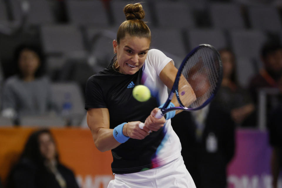 Maria Sakkari, of Greece, hits during the first set in her match against Jessica Pegula in the WTA Finals tennis tournament in Fort Worth, Texas, Monday, Oct. 31, 2022. (AP Photo/Ron Jenkins)