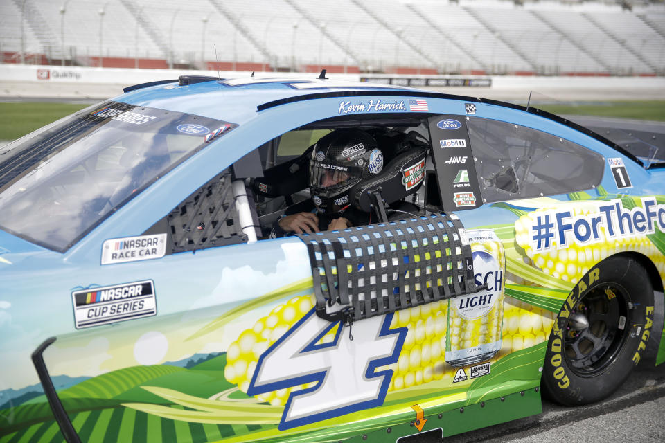 Kevin Harvick (4) gets ready before a NASCAR Cup Series auto race at Atlanta Motor Speedway, Sunday, June 7, 2020, in Hampton, Ga. (AP Photo/Brynn Anderson)