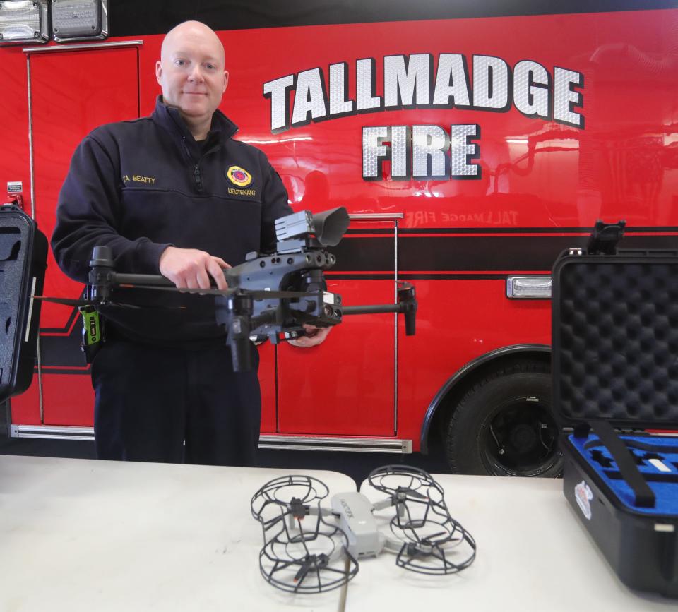 Tallmadge Fire Lt. Todd Beatty displays the new DJI Matrice drone that was purchased with ARPA funds.