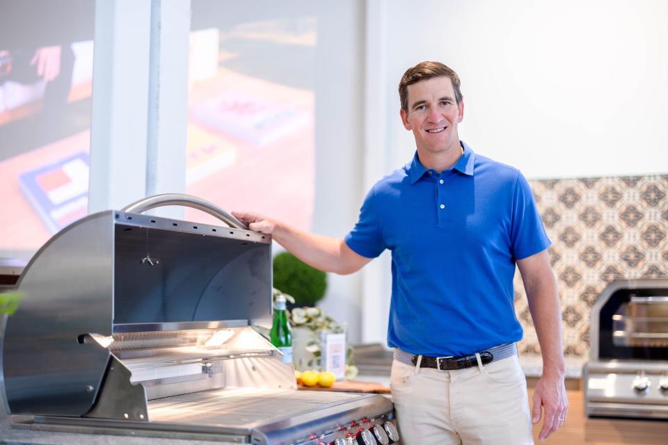 Eli Manning highlighting product at BBQGuys' Backyard Design Center in West Palm Beach, May 9, 2024.