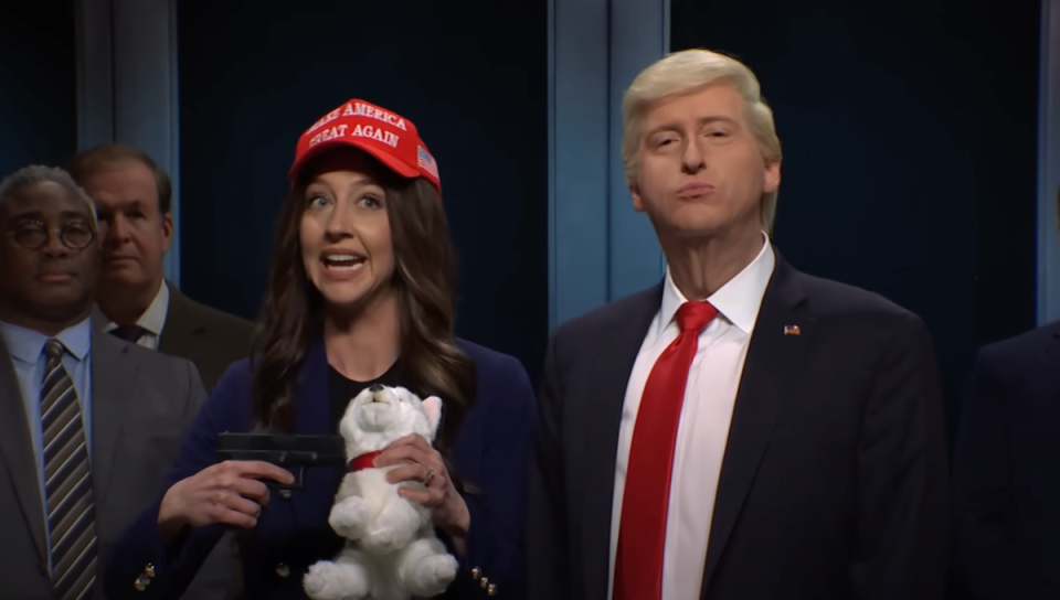 Heidi Gardner (left) dressed as Kristi Noem stands next to James Austin Johnson (right) dressed as Donald Trump. The skit poked fun at the recent revelation that Ms Noem shot and killed a puppy for its behaviour (Saturday Night Live)