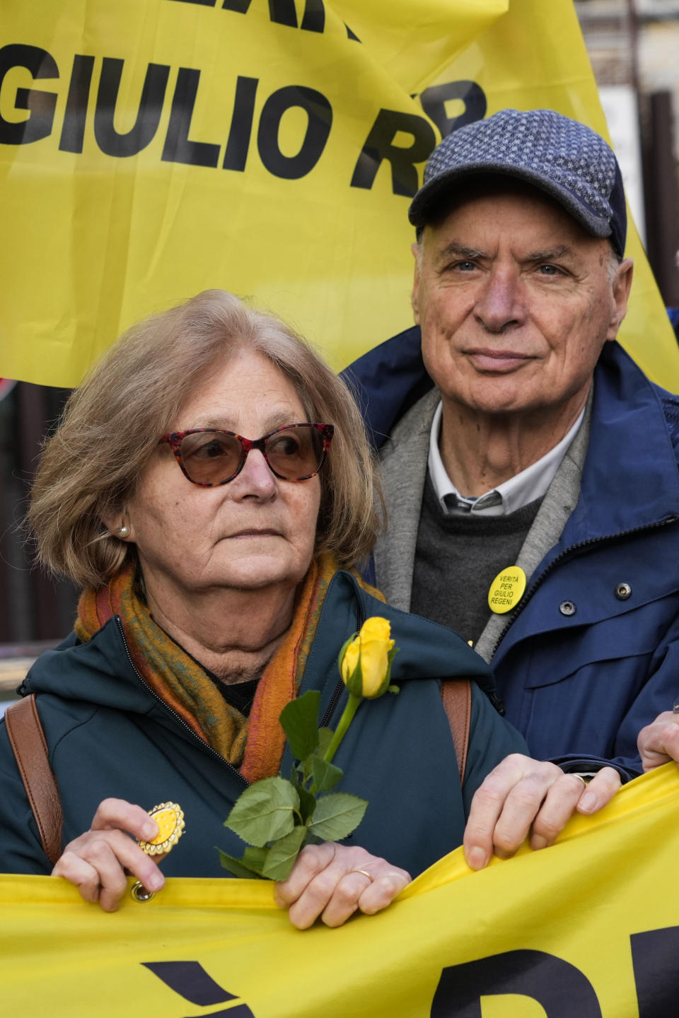 Paola, mother of Giulio Regeni, is flanked by by her husband Claudio prior to the start of the trial for the killing of Cambridge University researcher Giulio Regeni, outside the Rome's court, Tuesday, Feb. 20, 2024. Four high-level Egyptian security officials are going on trial in absentia in a Rome court, accused in the 2016 abduction, torture and slaying of an Italian doctoral student in Cairo. (AP Photo/Andrew Medichini)