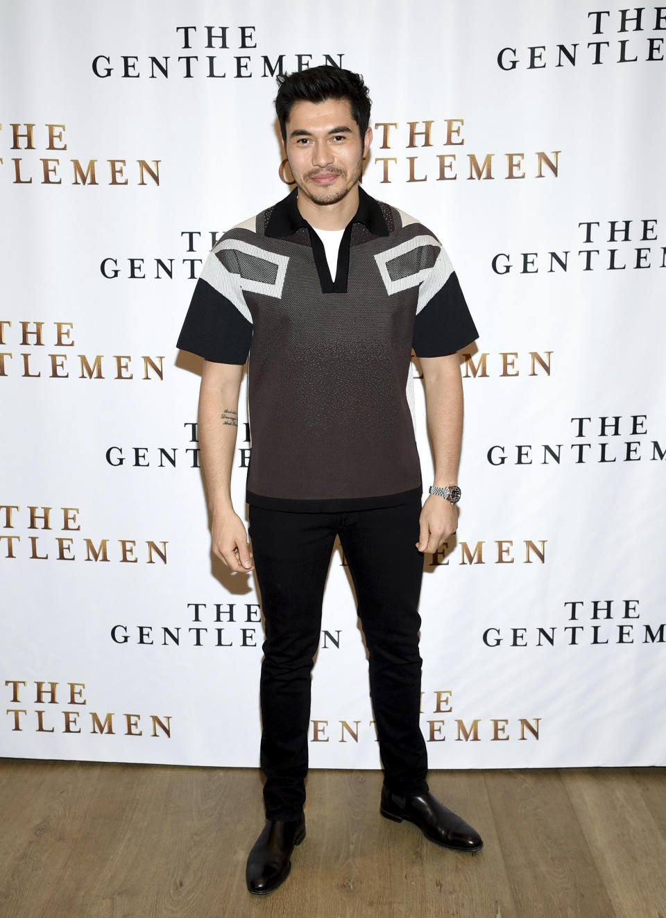 FILE - Henry Golding participates in "The Gentlemen" cast photo call on Jan. 11, 2020, in New York. Golding turns 35 on Feb. 5. (Photo by Evan Agostini/Invision/AP, File)