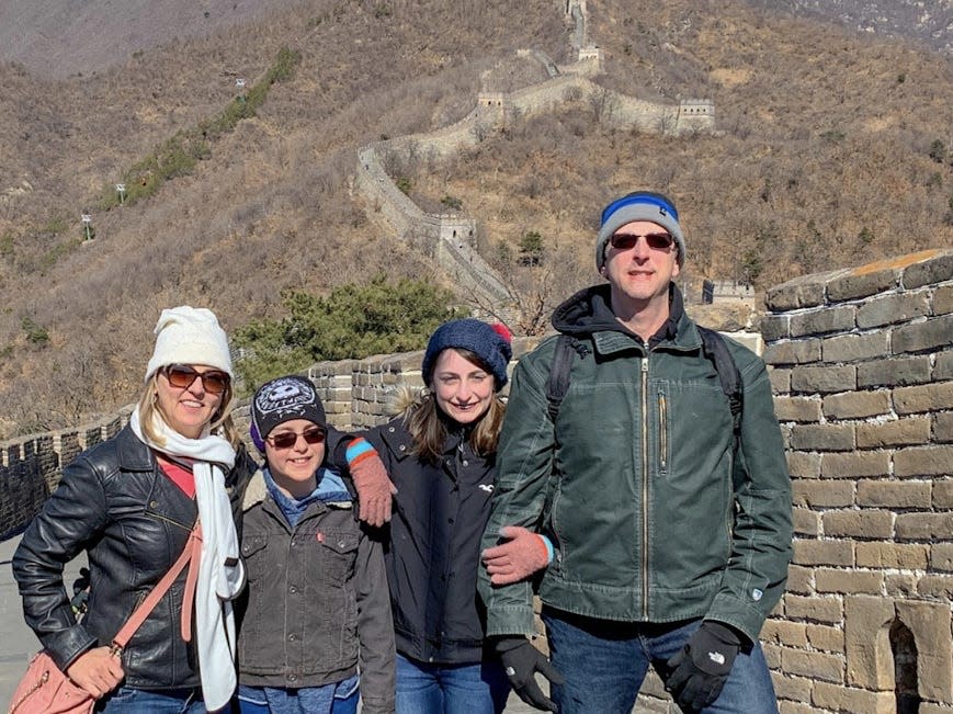 Lanin family standing on the Great Wall of China