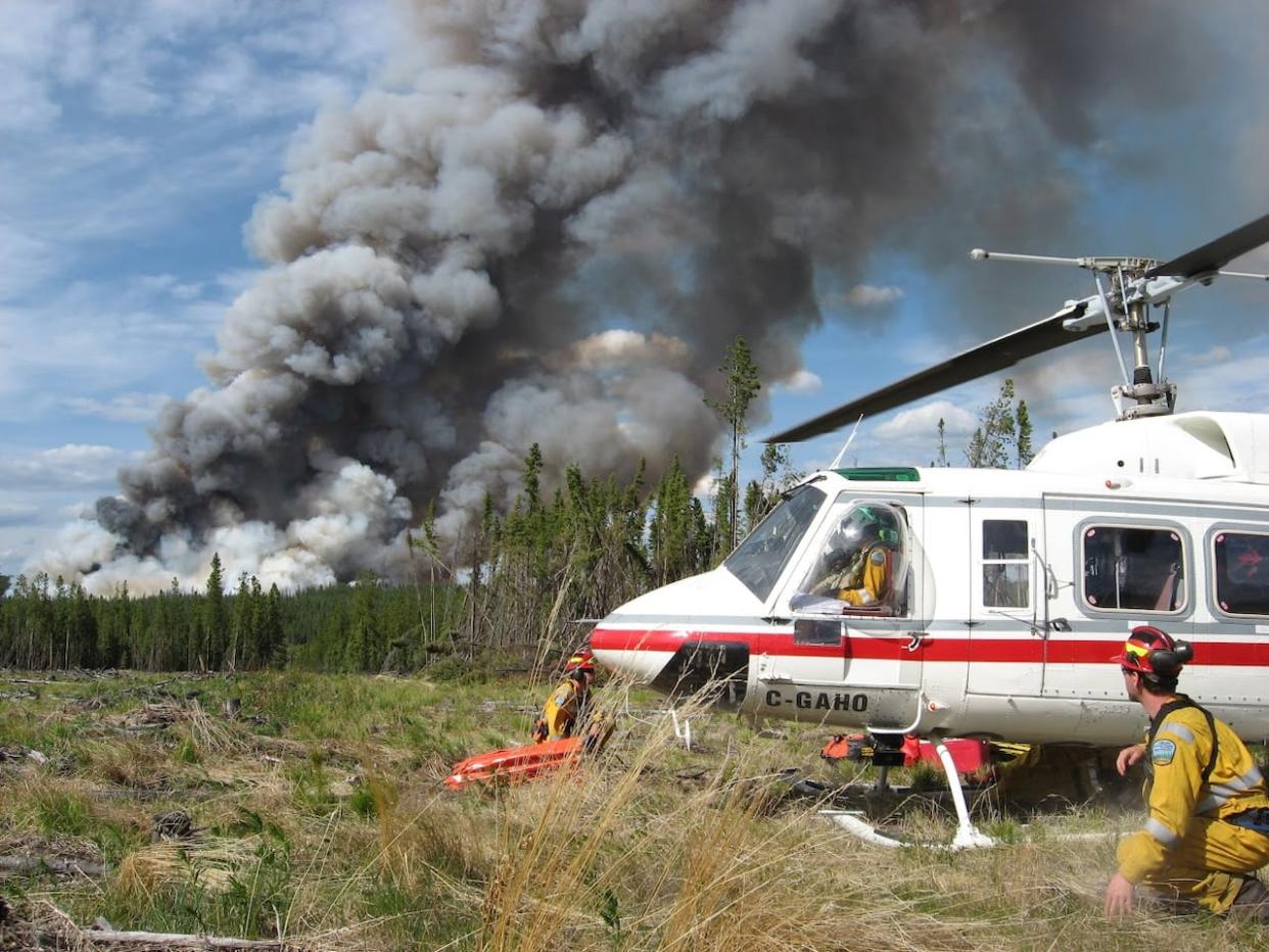 An Alberta Wildfire helitack crew prepares to deploy. (Alberta Wildfire/Facebook - image credit)