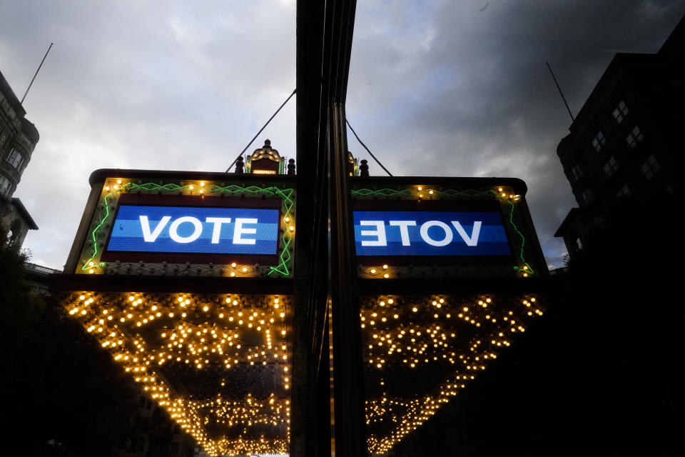 A marquee in downtown Atlanta displays the word "vote" on Election Day, Tuesday, Nov. 8, 2022, in Atlanta. (AP Photo/Brynn Anderson)
