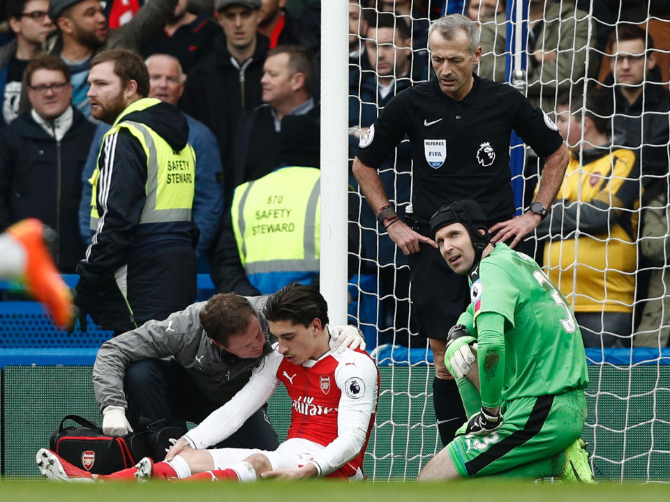 Hector Bellerin had to be substituted after taking a blow to the head against Chelsea: Getty