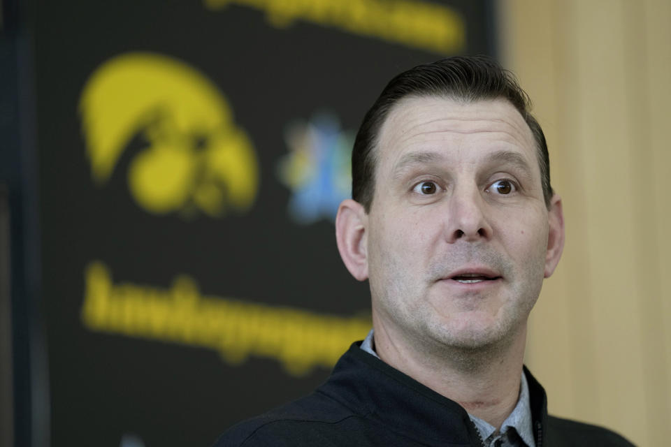 New Iowa offensive coordinator Tim Lester speaks during an NCAA college football news conference, Tuesday, Feb. 6, 2024, in Iowa City, Iowa. (AP Photo/Charlie Neibergall)