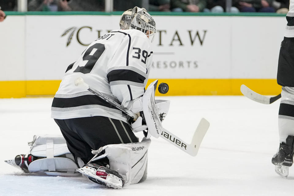 Los Angeles Kings goaltender Cam Talbot makes a save against the Dallas Stars during the first period of an NHL hockey game, Tuesday, Jan. 16, 2024, in Dallas. (AP Photo/Julio Cortez)