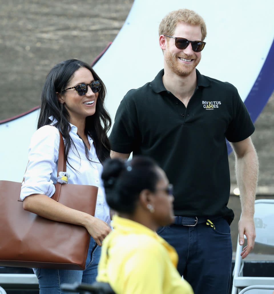 Prince Harry and Meghan Markle held hands for the first time in public at the Invictus Games. Source: Getty