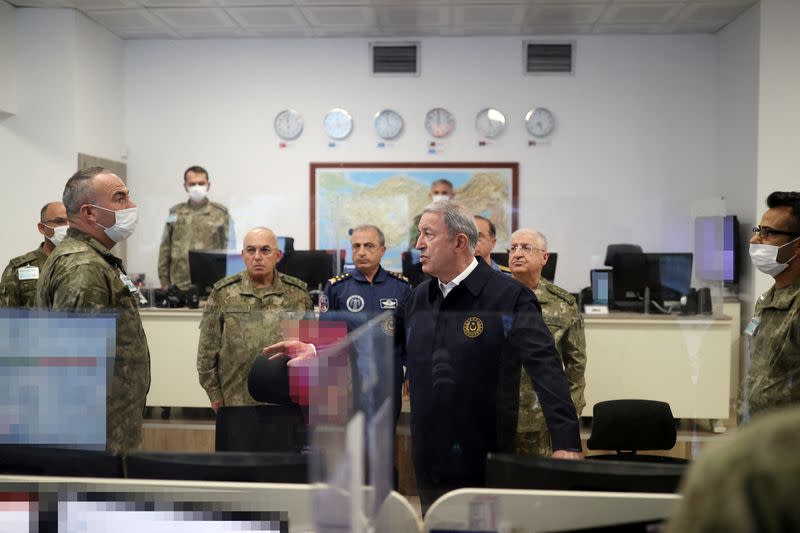 Turkish Defence Minister Hulusi Akar visits Land Forces Operation Center in Ankara