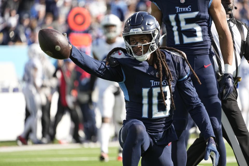 Tennessee Titans' DeAndre Hopkins celebrates a first down during the first half of an NFL football game against the Indianapolis Colts, Sunday, Dec. 3, 2023, in Nashville, Tenn. (AP Photo/George Walker IV)