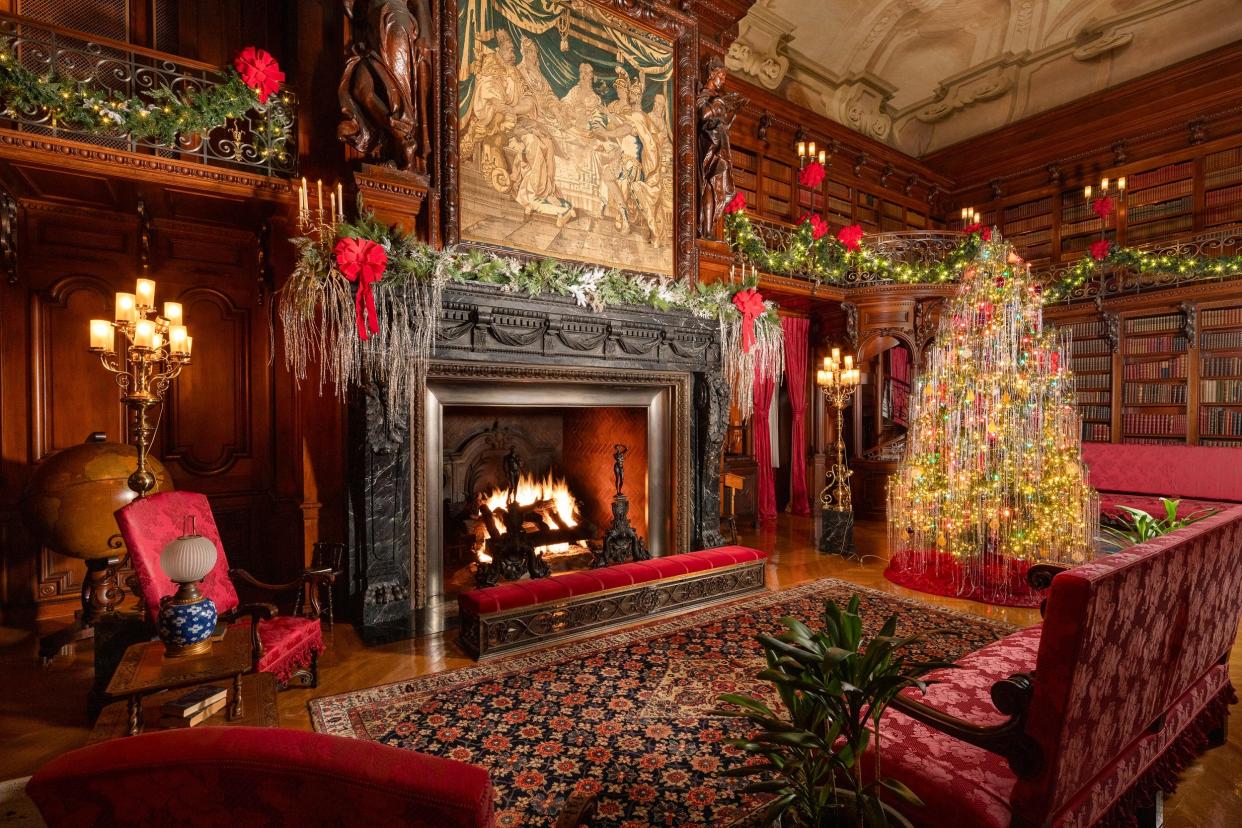 In honor of Hallmark Channel having filmed "A Biltmore Christmas" at Biltmore Estate, the Library in Biltmore House is dressed in the classic style of the movie's 1940s-era setting, including a Christmas tree with dramatic cascades of silver-sequined tinsel.