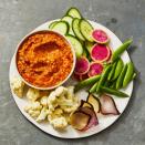 <p>Roasted almonds and marinated peppers come together in this flavorful dip that pairs perfectly with vegetables or crackers. </p><p>Get the <a href="https://www.goodhousekeeping.com/food-recipes/a39876818/roasted-red-pepper-dip-recipe/" rel="nofollow noopener" target="_blank" data-ylk="slk:Roasted Pepper Dip recipe;elm:context_link;itc:0;sec:content-canvas" class="link "><strong>Roasted Pepper Dip recipe</strong></a>. </p>