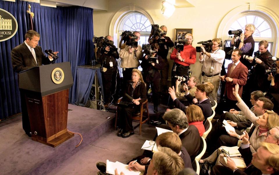 President George W. Bush calls on a reporter during his first news conference at the White House on Feb. 22, 2001, in Washington.  The president spoke at his first White House news conference a month after his inauguration. He said one of his early goals was to "change the tone"' in Washington and "encourage civil discourse. I think we're making good progress.''
