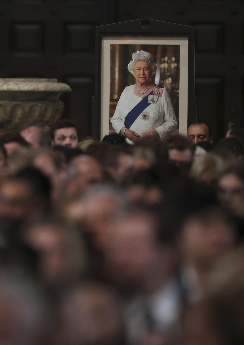 Members of the public attend a Service of Prayer and Reflection, following the passing of Britain's Queen Elizabeth II, at St Paul's Cathedral in London, Friday Sept. 9, 2022. (Paul Childs/Pool via AP)