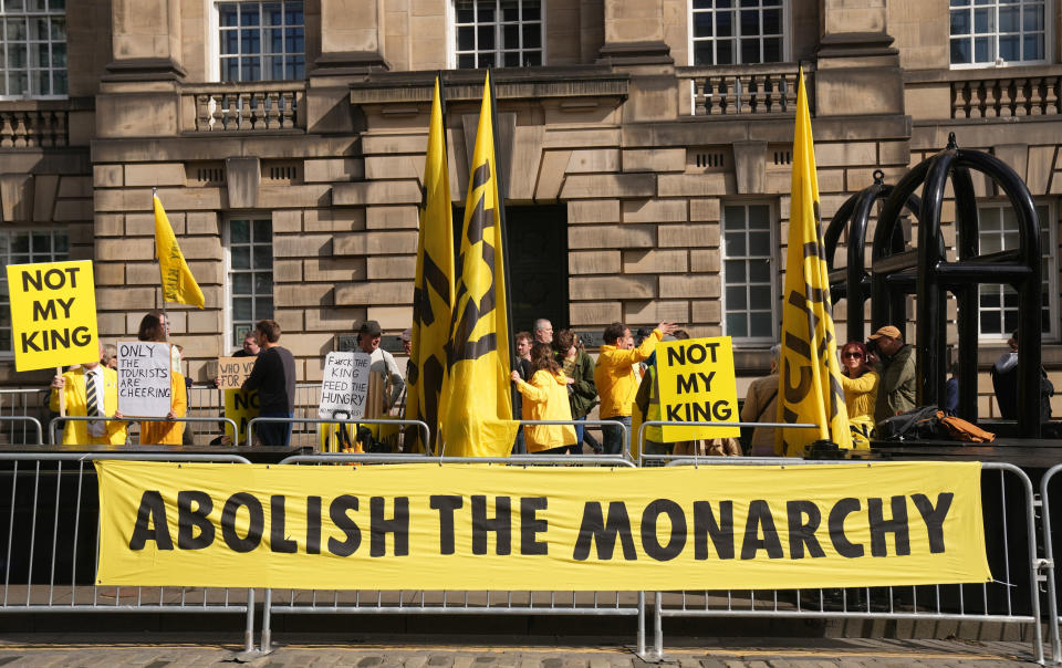 EDINBURGH, SCOTLAND - JULY 05: (EDITORS NOTE: Image contains profanity) Anti-monarchy protesters gather near St Giles&#39; Cathedral along the Royal Mile ahead of a National Service of Thanksgiving and Dedication To The Coronation Of King Charles III And Queen Camilla on July 05, 2023 in Edinburgh, Scotland. Anti-monarchy groups, including Republic and Our Republic, are demonstrating in Edinburgh today. The protests are scheduled to disrupt ceremonial events to mark King Charles III&#39;s coronation. (Photo by Danny Lawson - Pool/Getty Images)