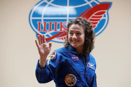 FILE PHOTO: Crew member Meir attends a news conference ahead of the mission to the International Space Station in Baikonur