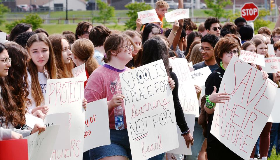 McDowell High School students protest gun violence in schools by standing along West 38th Street in Millcreek Township on June 2, 2022. At least 200 students gathered in support of Robb Elementary School in Uvalde, Texas, where 21 were killed, including 19 children, on May 24. All of the McDowell students said that schools should be a safe place of learning and not fear. 