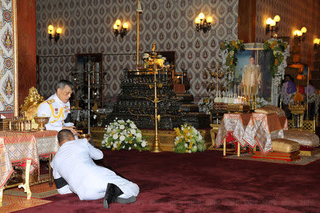 Thailand's Crown Prince Maha Vajiralongkorn takes part in a ceremony honouring Thailand's late King Bhumibol Adulyadej at the Grand Palace in Bangkok, Thailand, October 24, 2016. Picture taken October 24, 2016. Picture has been watermarked from source. Thailand Royal Household Bureau/Handout via REUTERS