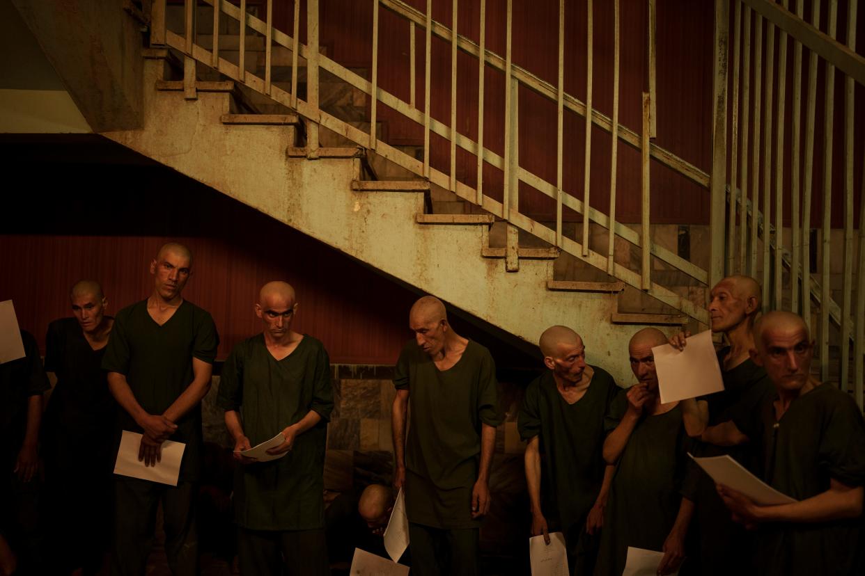 Drug users detained in a Taliban raid wait to be taken to their room in the detoxification ward of the Avicenna Medical Hospital for Drug Treatment in Kabul, Afghanistan, Saturday, Oct. 2, 2021.