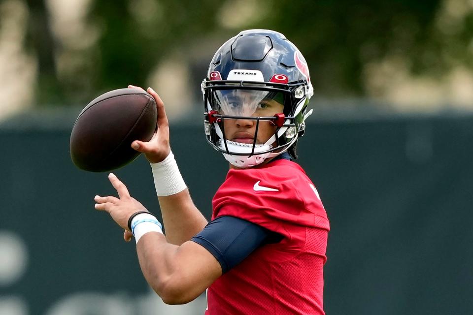 Houston Texans quarterback C.J. Stroud throws a pass during rookie minicamp.