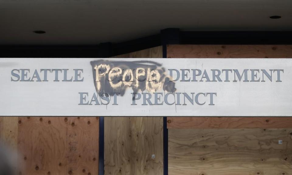 A modified sign for the Seattle police department’s east precinct building.