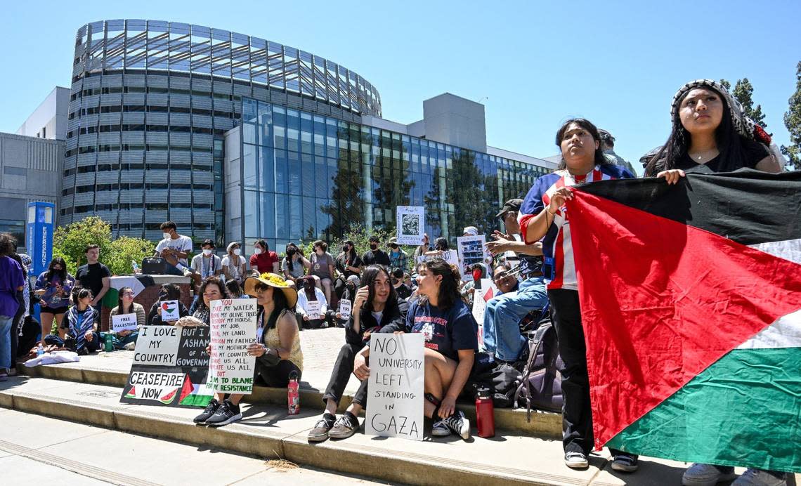 Students and other supporters gather in the Free Speech area at Fresno State while holding Palestinian flags and signs during a peaceful pro-Palestinian sit-in organized by Students for Palestinian Liberation on Wednesday, May 1, 2024.