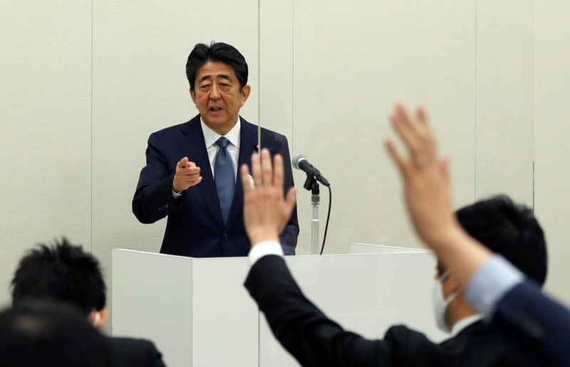 Former Japanese PM Shinzo Abe holds a news conference in Tokyo