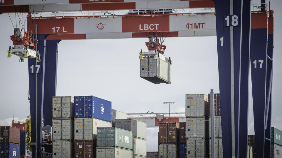 An ocean container being lifted in the Port of Long Beach