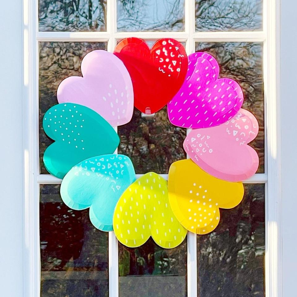 <p>The simple secret to this creative rainbow door hanging? Heart-shaped paper plates!</p><p>Get the <strong><a href="https://akailochiclife.com/2021/02/diy-rainbow-patterned-heart-wreath.html" rel="nofollow noopener" target="_blank" data-ylk="slk:Rainbow Patterned Heart Wreath tutorial;elm:context_link;itc:0;sec:content-canvas" class="link ">Rainbow Patterned Heart Wreath tutorial</a></strong> at A Kailo Chic Life.</p><p><a class="link " href="https://www.amazon.com/Winoo-Design-Valentines-Plates-Decorations/dp/B0BKZBH65L/?tag=syn-yahoo-20&ascsubtag=%5Bartid%7C10070.g.2138%5Bsrc%7Cyahoo-us" rel="nofollow noopener" target="_blank" data-ylk="slk:Shop Now;elm:context_link;itc:0;sec:content-canvas">Shop Now</a></p>