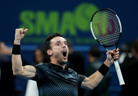 Tennis - ATP - Qatar Open - Khalifa International Tennis and Squash Complex, Doha, Qatar - January 5, 2019 Spain's Roberto Bautista Agut celebrates winning the final against Czech Republic's Tomas Berdych REUTERS/Ibraheem Al Omari