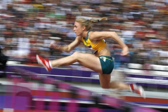 Australia's Sally Pearson competes during her women's 100m hurdles round 1 heat during the London 2012 Olympic Games at the Olympic Stadium August 6, 2012.