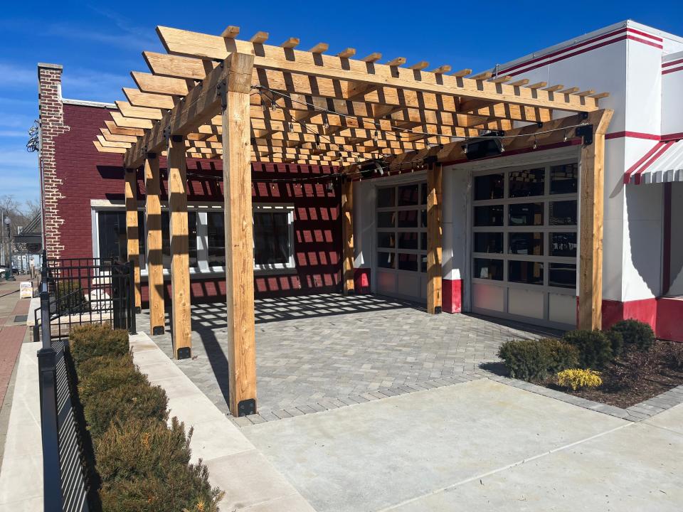 A pergola is constructed at South Main Street, a new music and social-gathering venture by Mike Wolfe in downtown Columbia, Tenn. on Feb. 7, 2024.
