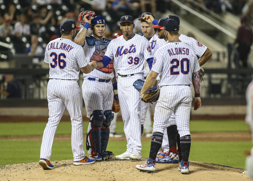 Jul 5, 2019; New York City, NY, USA; New York Mets manager Mickey Callaway (36) removes pitcher Edwin Diaz (39) from the game in the ninth inning against the Philadelphia Phillies at Citi Field. Mandatory Credit: Wendell Cruz-USA TODAY Sports