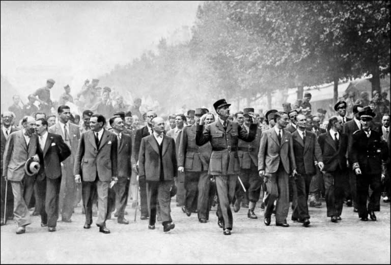 General Charles de Gaulle celebrated the August 25, 1944, liberation of Paris from Nazi Germany on the Champs-Elysees