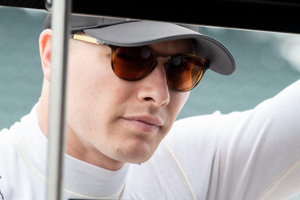 Team Penske driver Josef Newgarden (2) looks in his press box Friday, May 12, 2023, during practice for the GMR Grand Prix at Indianapolis Motor Speedway. 