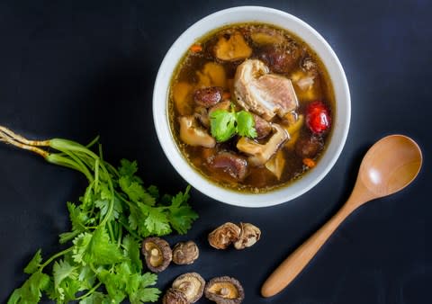 Bak kut teh, a local savoury pork soup served in Singapore - Credit: istock