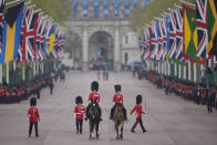 <p>Foot Guards gather near the Admiralty Arch in preparation for the coronation ceremony for Britain's King Charles III in London Saturday, May 6, 2023. (AP Photo/Vadim Ghirda)</p> 