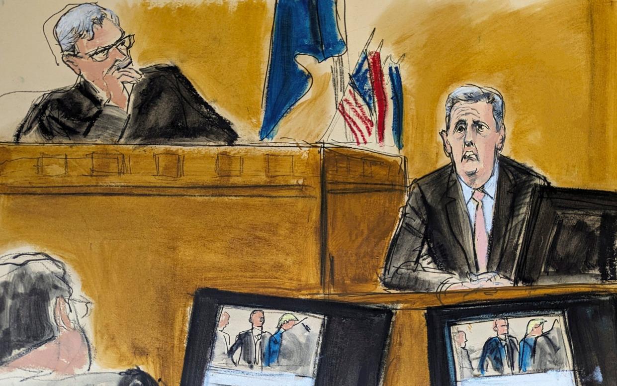 Michael Cohen, right, testifies on the witness stand