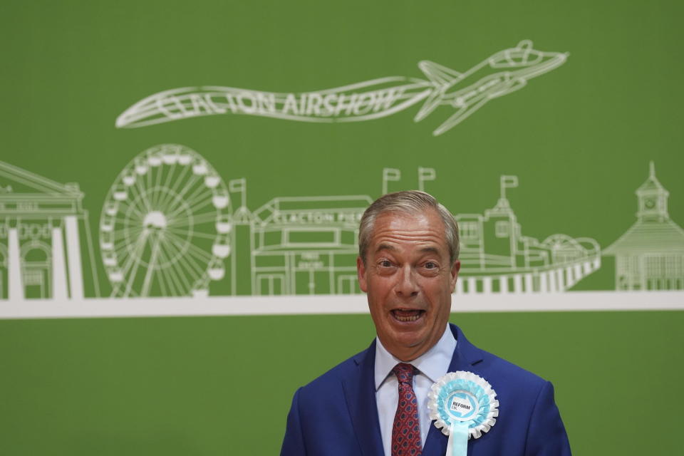 Reform UK leader Nigel Farage gives a victory speech after winning his seat at Clacton Leisure Centre in Clacton, England, Friday July 5, 2024. Britain's Labour Party headed for a landslide victory Friday in a parliamentary election, an exit poll suggested, as voters punished the governing Conservatives after 14 years of economic and political upheaval. (Joe Giddens/PA Wire/PA via AP)