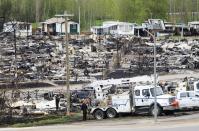 A trailer park damaged by the wildfires is seen in Fort McMurray, Alta., on Monday, May 9, 2016. THE CANADIAN PRESS/Ryan Remiorz