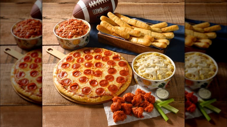 Pizza, wings, and bread.