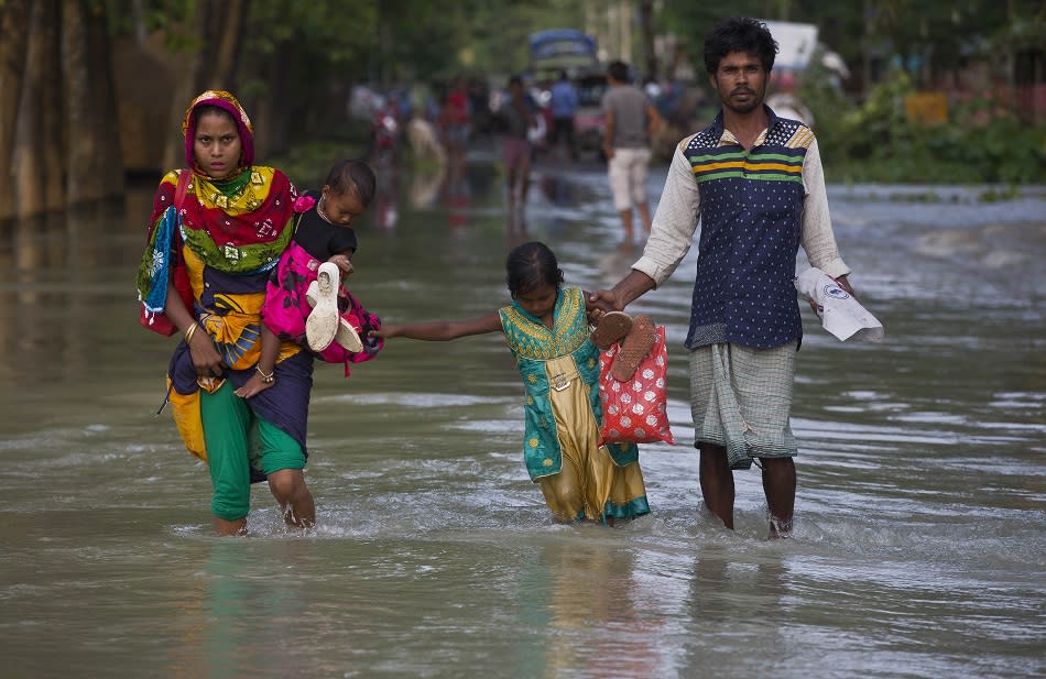 印度東北部近日暴雨成災，災情最嚴重的阿薩姆省（Assam）超過580萬人流離失所。   圖：達志影像/美聯社
