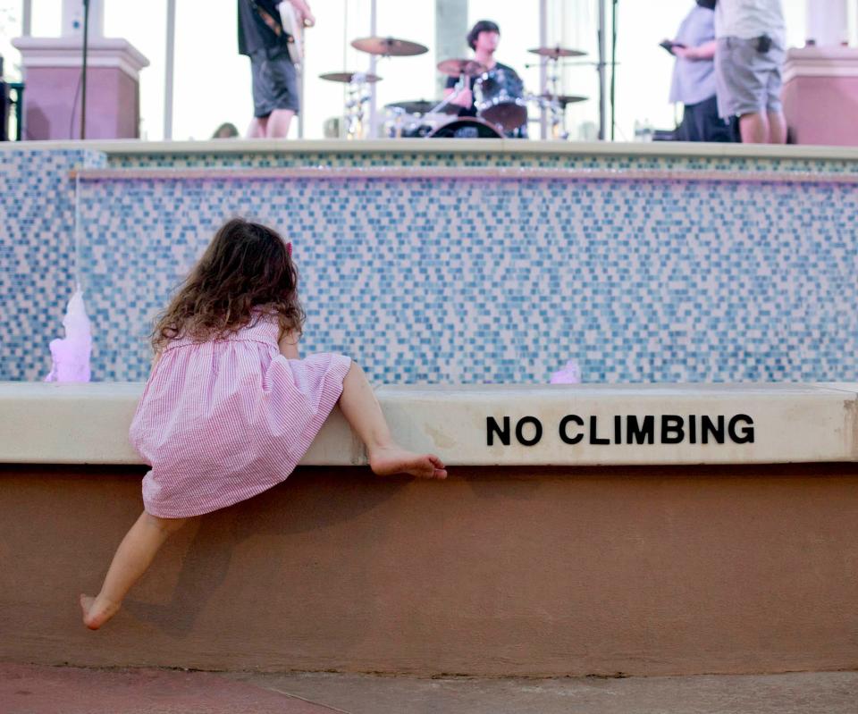 In this photo from November 07, 2015 showing an unidentified child at the fountain at Harbourside Place during a music event. Brianna Soukup / The Palm Beach Post