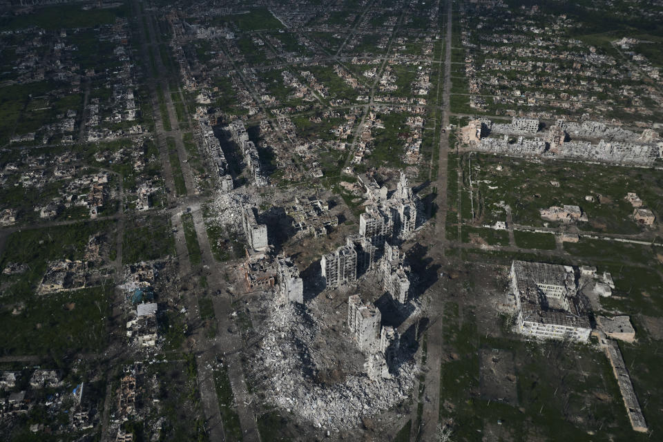 FILE - An aerial view of Bakhmut, the site of the heaviest battles with Russian troops in the Donetsk region, Ukraine, Thursday, June 22, 2023. Ukraine's June 10 recapture of the small village of Neskuchne in the eastern Donetsk region encapsulates the progress of its much-anticipated counteroffensive: small platoon-sized operations banking on the element of surprise and, when successful, notching incremental territorial gains. (AP Photo/Libkos, File)