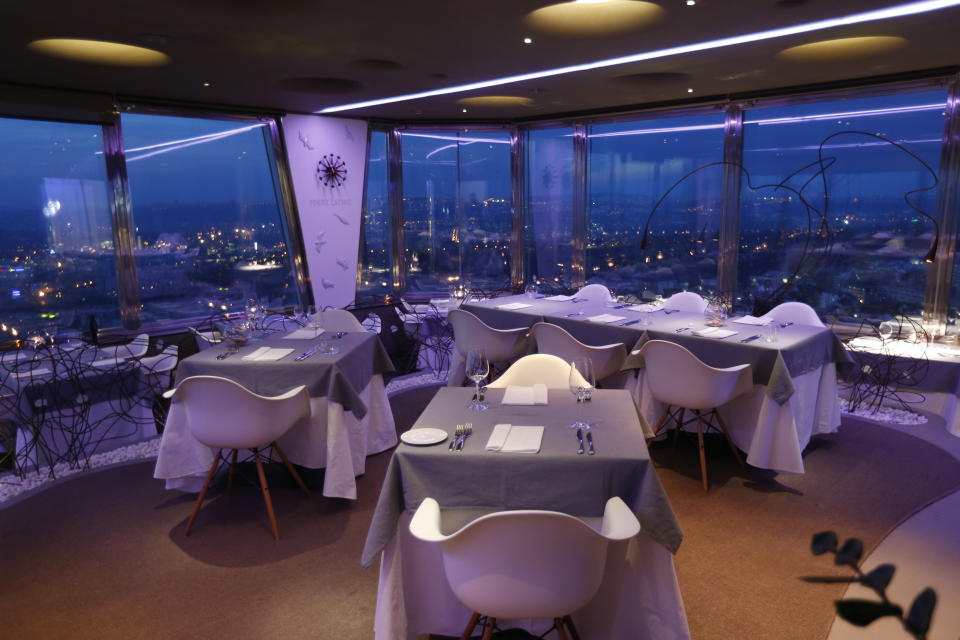 In this picture taken March 6, 2913, a view of a restaurant at the Zizkov television tower in Prague, Czech Republic is photographed. Following its completion in 1992, the 216-meter (236-yard) tall television tower in the Czech capital has become a dominant landmark of the city skyline that offers a breathtaking view of Prague from its restaurant and observation desk. (AP Photo/Petr David Josek)